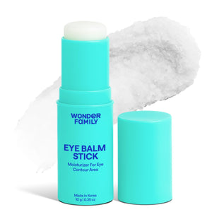 Hydrating Korean Under Eye Balm Stick with Niacinamide being applied to soothe dark circles and puffiness.