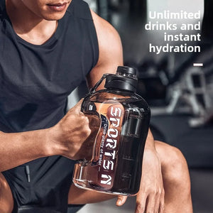 Person holding a large sports drink container with text about hydration.