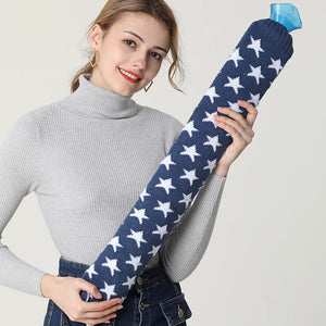 Woman holding a blue and white star-patterned product against a plain background