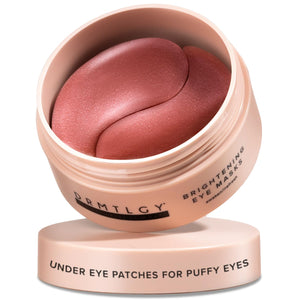 A jar of DRMTLGY Brightening Eye Masks containing 60 gold-tinted hydrogel patches.