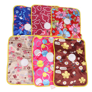 Set of colorful fabric pouches with various patterns on a white background