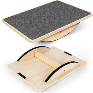 Wooden balance board with a gray textured surface on a white background
